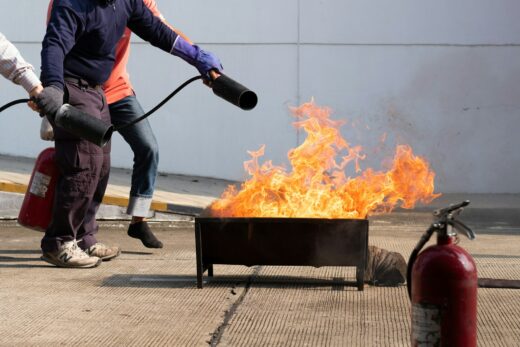 The instructor demonstrate and training the fire extinguisher use, fire evacuation training.